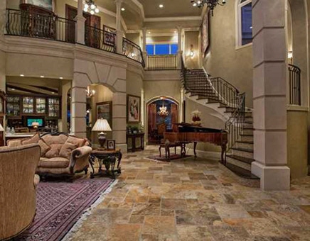 Sumptuous stairs leading to the game and media room